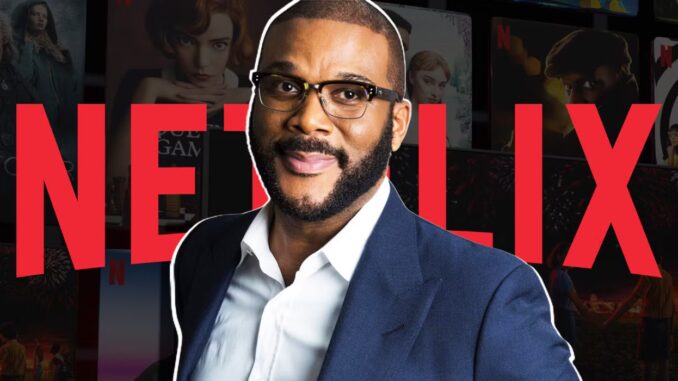 tyler-perry-in-front-of-netflix-logo